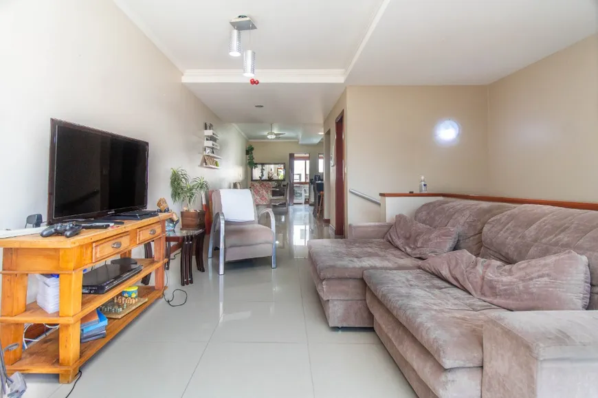Foto 1 de Casa de Condomínio com 3 Quartos à venda, 209m² em Mário Quintana, Porto Alegre