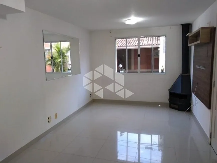 Foto 1 de Casa de Condomínio com 4 Quartos à venda, 89m² em Humaitá, Porto Alegre