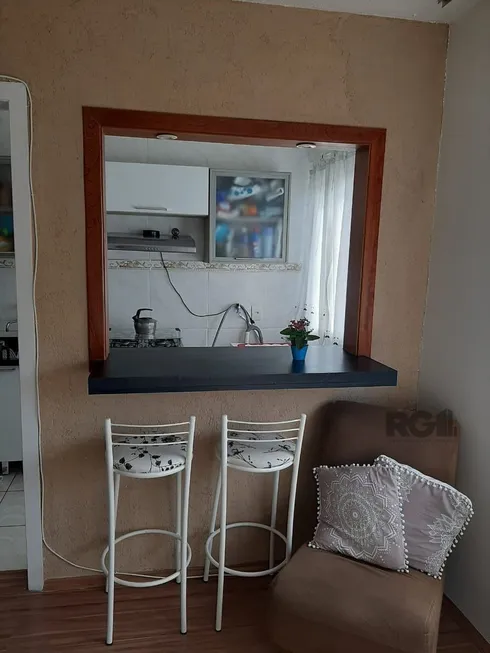 Foto 1 de Apartamento com 1 Quarto à venda, 34m² em Santo Antônio, Porto Alegre