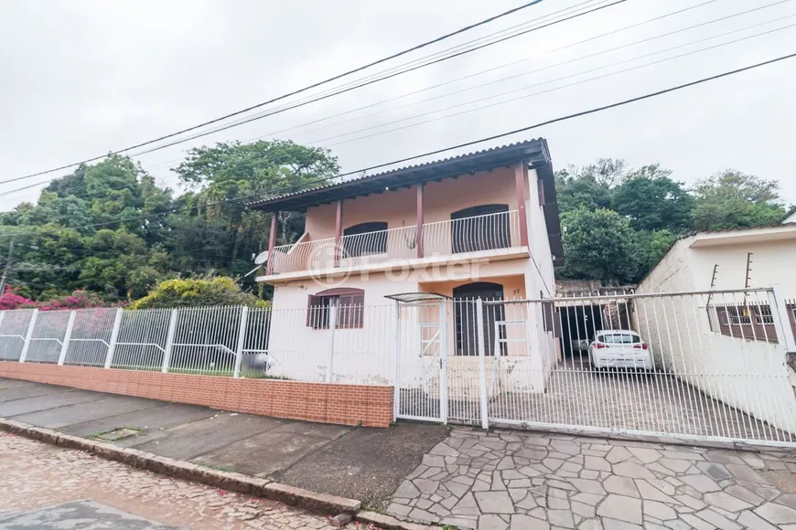 Foto 1 de Casa com 5 Quartos à venda, 400m² em Partenon, Porto Alegre