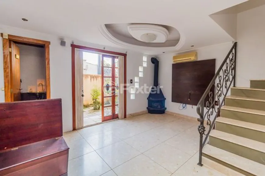 Foto 1 de Casa de Condomínio com 3 Quartos à venda, 167m² em Setimo Ceu, Porto Alegre