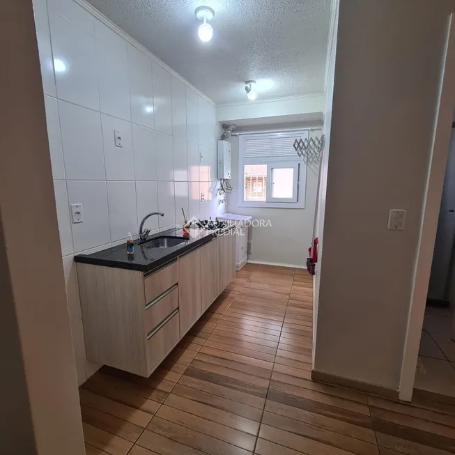 Foto 1 de Apartamento com 2 Quartos à venda, 44m² em Restinga, Porto Alegre
