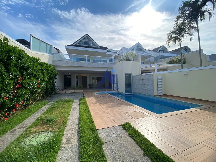 Foto 1 de Casa com 7 Quartos à venda, 381m² em Barra da Tijuca, Rio de Janeiro