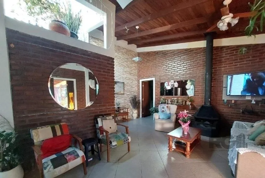 Foto 1 de Casa com 3 Quartos à venda, 301m² em Tarumã, Viamão