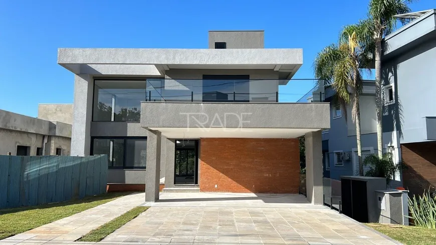 Foto 1 de Casa de Condomínio com 4 Quartos à venda, 349m² em Alphaville, Porto Alegre