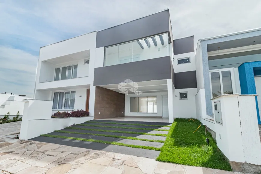 Foto 1 de Casa de Condomínio com 3 Quartos à venda, 165m² em Hípica, Porto Alegre