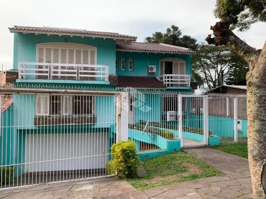 Foto 1 de Casa com 4 Quartos à venda, 620m² em Três Figueiras, Porto Alegre