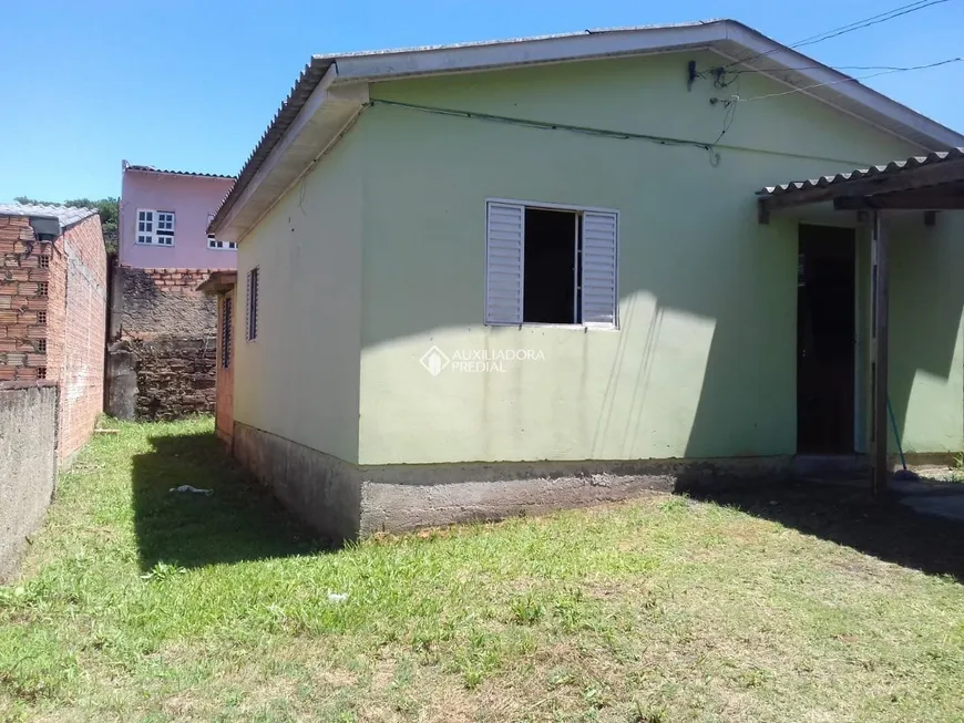 Foto 1 de Casa com 3 Quartos à venda, 58m² em Aparecida, Alvorada