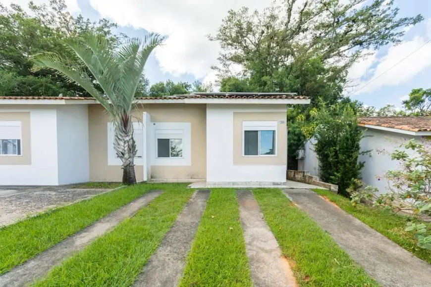 Foto 1 de Casa de Condomínio com 2 Quartos à venda, 47m² em Stella Maris, Alvorada