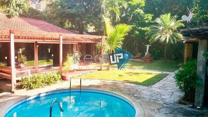 Foto 1 de Casa com 7 Quartos à venda, 450m² em Cosme Velho, Rio de Janeiro