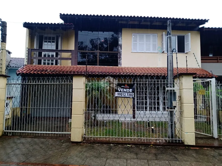 Foto 1 de Casa com 4 Quartos à venda, 284m² em Ipanema, Porto Alegre