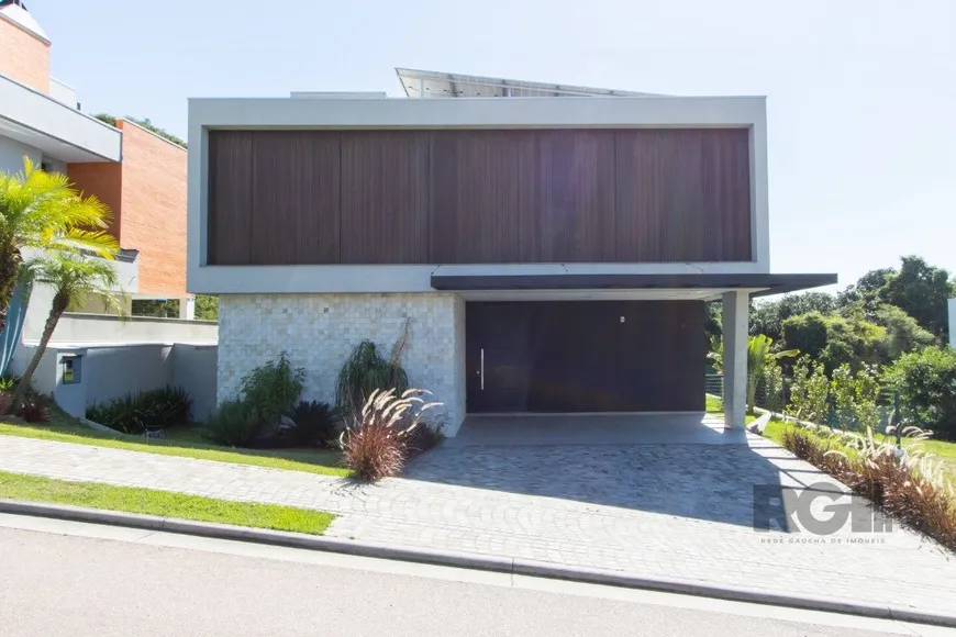 Foto 1 de Casa de Condomínio com 4 Quartos à venda, 291m² em Vila Nova, Porto Alegre