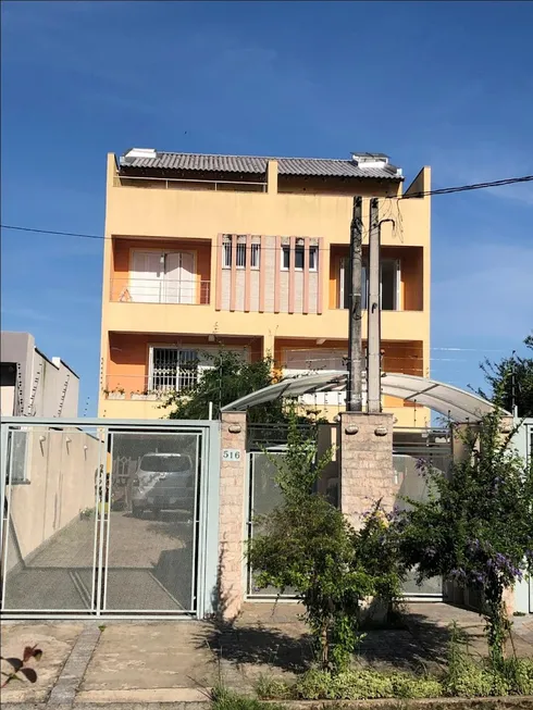 Foto 1 de Casa com 4 Quartos à venda, 396m² em Jardim Itú Sabará, Porto Alegre