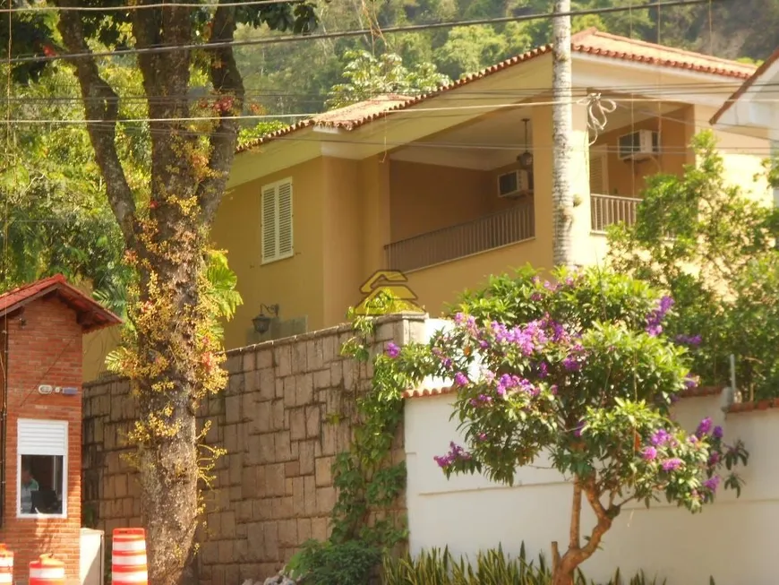 Foto 1 de Casa com 4 Quartos à venda, 650m² em Cosme Velho, Rio de Janeiro