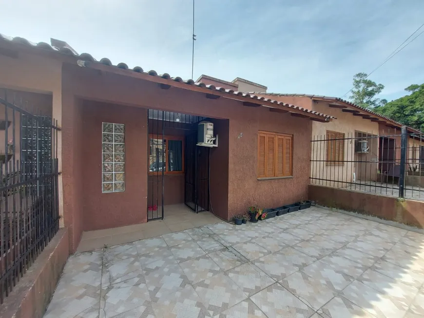 Foto 1 de Casa com 2 Quartos à venda, 58m² em Krahe, Viamão