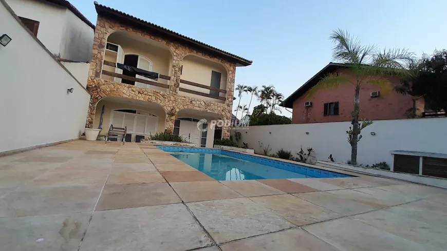 Foto 1 de Casa de Condomínio com 4 Quartos à venda, 600m² em Barra da Tijuca, Rio de Janeiro