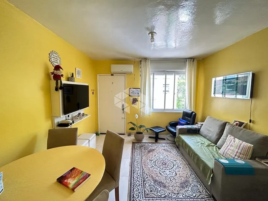 Foto 1 de Apartamento com 1 Quarto à venda, 40m² em Humaitá, Porto Alegre