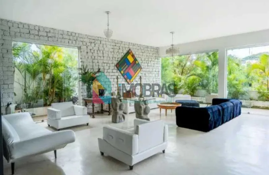 Foto 1 de Casa de Condomínio com 7 Quartos para venda ou aluguel, 710m² em Laranjeiras, Rio de Janeiro