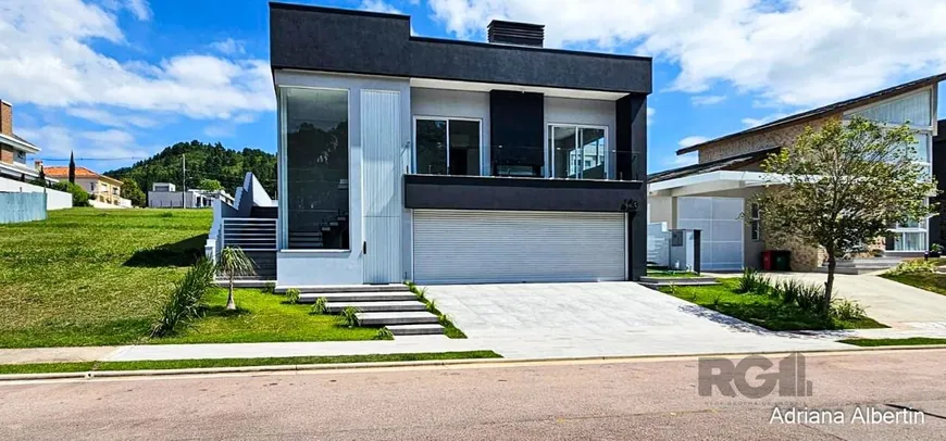 Foto 1 de Casa de Condomínio com 4 Quartos à venda, 298m² em Alphaville, Porto Alegre