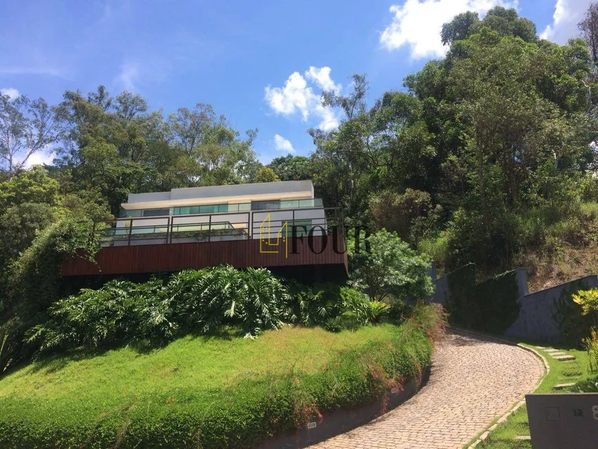 Foto 1 de Casa de Condomínio com 4 Quartos para venda ou aluguel, 480m² em Condominio Quintas do Sol, Nova Lima