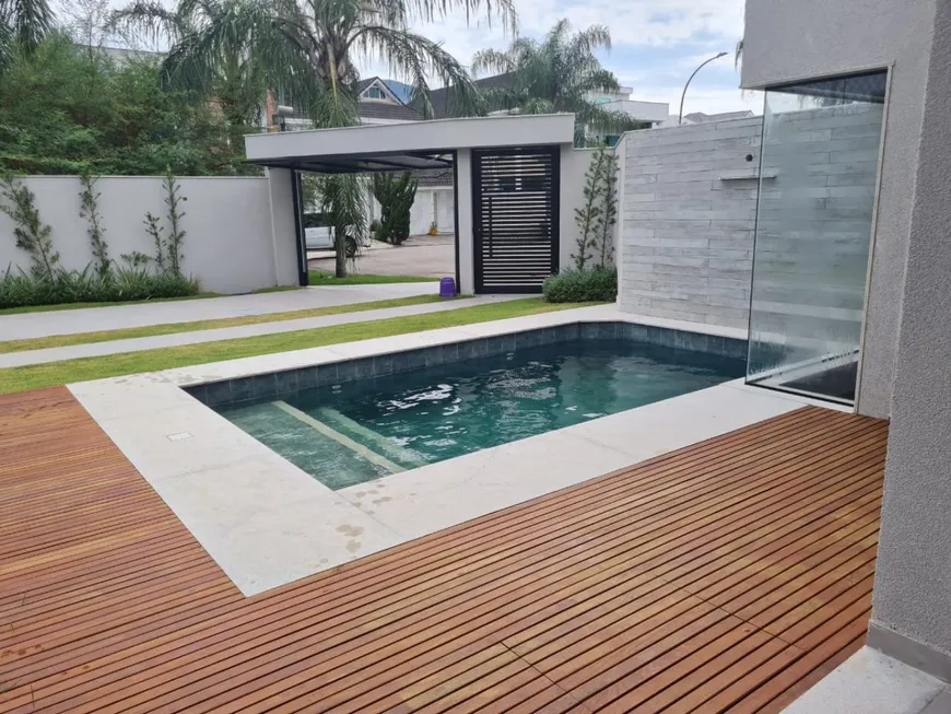 Foto 1 de Casa de Condomínio com 4 Quartos à venda, 410m² em Barra da Tijuca, Rio de Janeiro