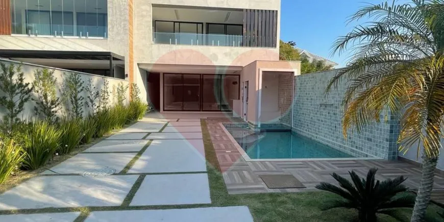 Foto 1 de Casa de Condomínio com 5 Quartos à venda, 300m² em Barra da Tijuca, Rio de Janeiro