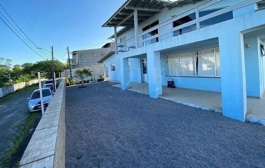 Foto 1 de Casa com 5 Quartos à venda, 210m² em Estreito, Florianópolis