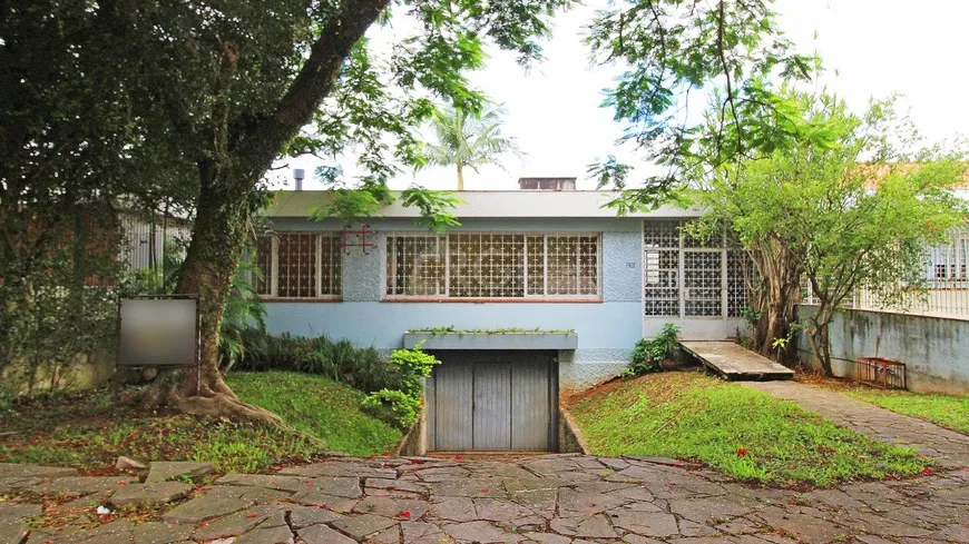 Foto 1 de Casa com 6 Quartos à venda, 349m² em Três Figueiras, Porto Alegre