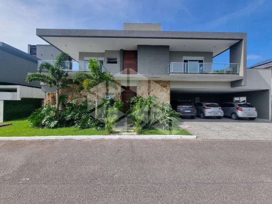 Foto 1 de Casa com 3 Quartos para alugar, 448m² em Cacupé, Florianópolis