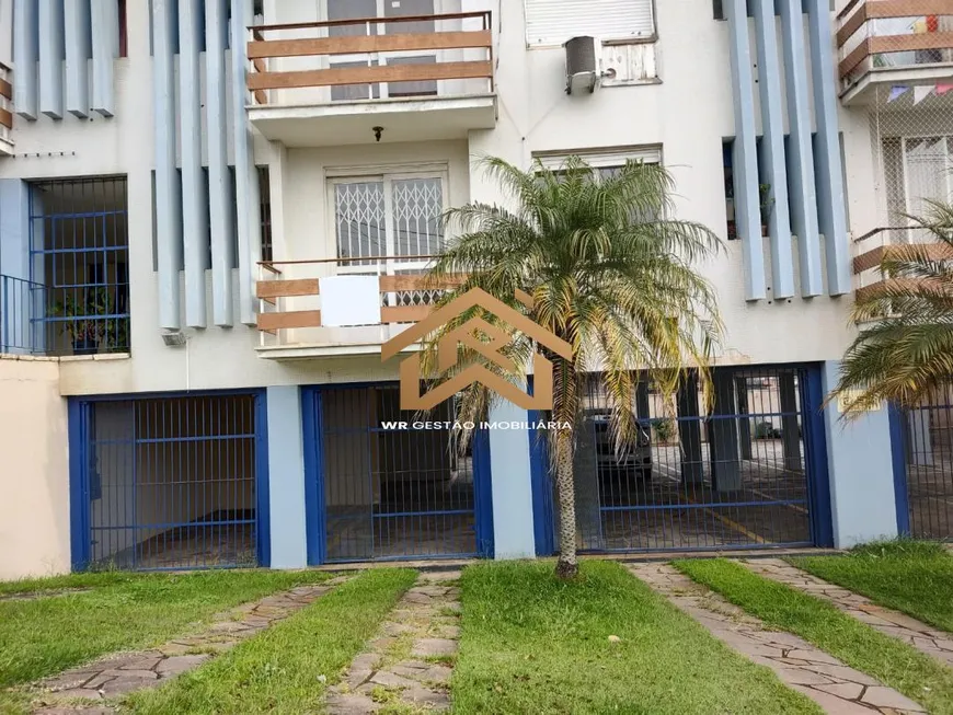 Foto 1 de Apartamento com 2 Quartos à venda, 48m² em Santo Antônio, Porto Alegre