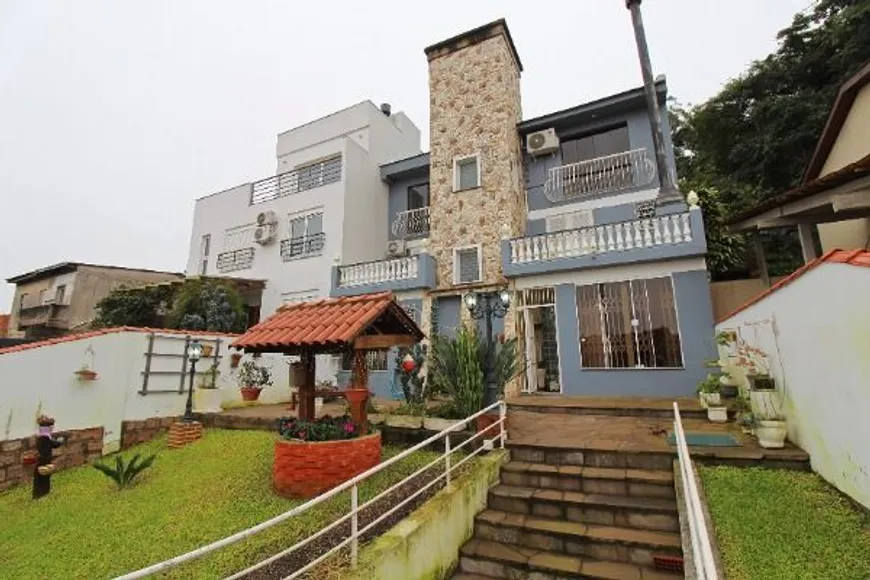 Foto 1 de Casa com 3 Quartos à venda, 300m² em Ipanema, Porto Alegre