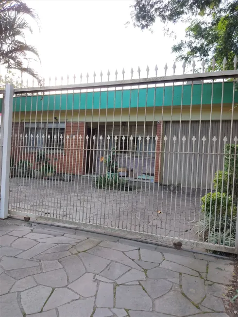 Foto 1 de Casa com 4 Quartos à venda, 246m² em Morro Santana, Porto Alegre