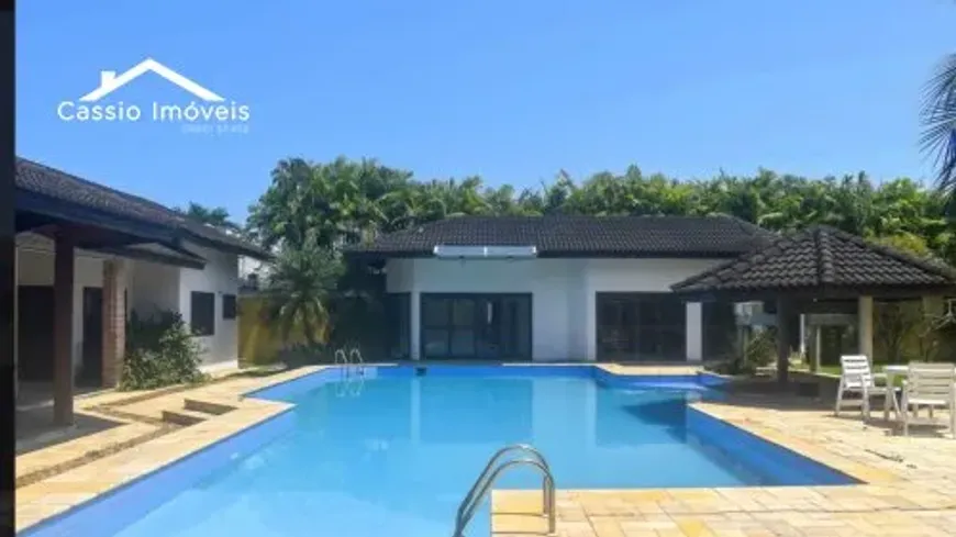 Foto 1 de Casa de Condomínio com 7 Quartos à venda, 778m² em Jardim Acapulco , Guarujá