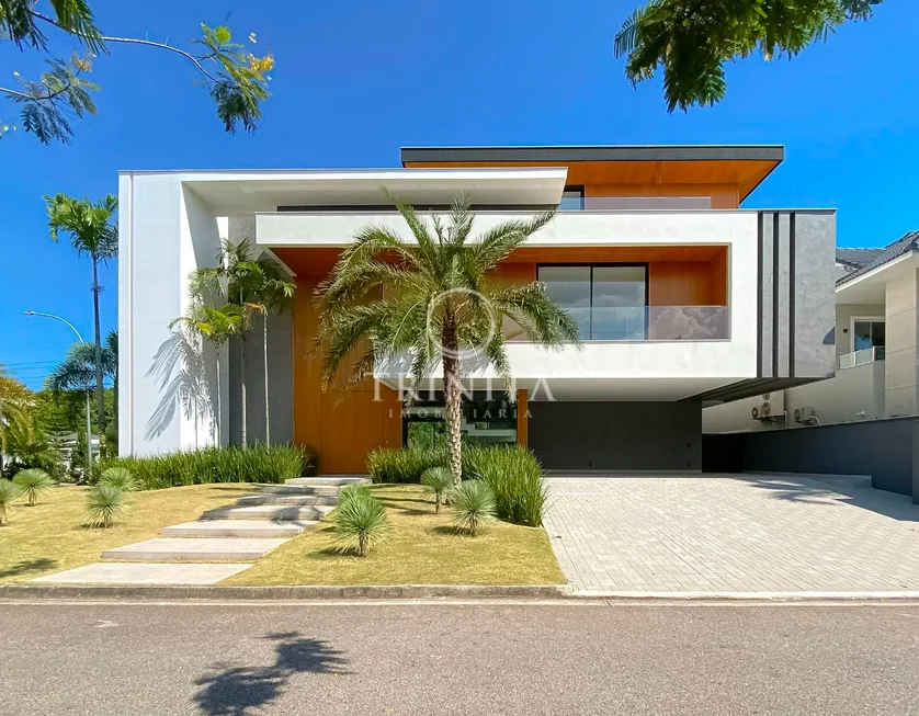 Foto 1 de Casa de Condomínio com 4 Quartos à venda, 1100m² em Barra da Tijuca, Rio de Janeiro