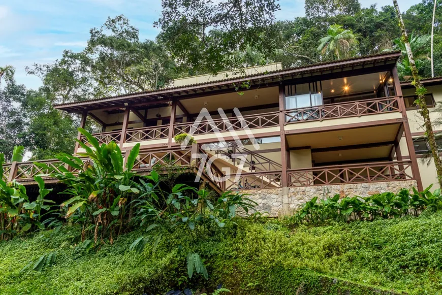 Foto 1 de Casa de Condomínio com 7 Quartos à venda, 338m² em Iporanga, Guarujá