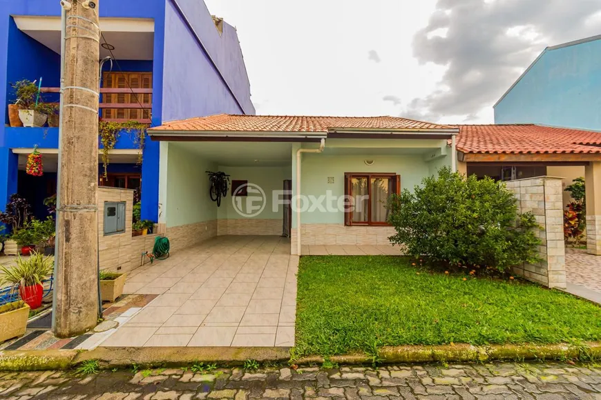 Foto 1 de Casa de Condomínio com 2 Quartos à venda, 166m² em Guarujá, Porto Alegre