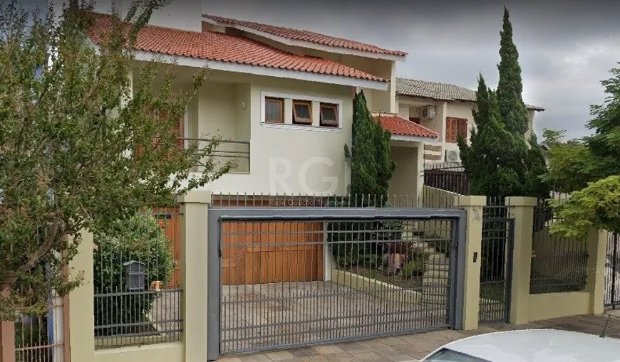 Foto 1 de Casa com 4 Quartos à venda, 311m² em Jardim Itú Sabará, Porto Alegre