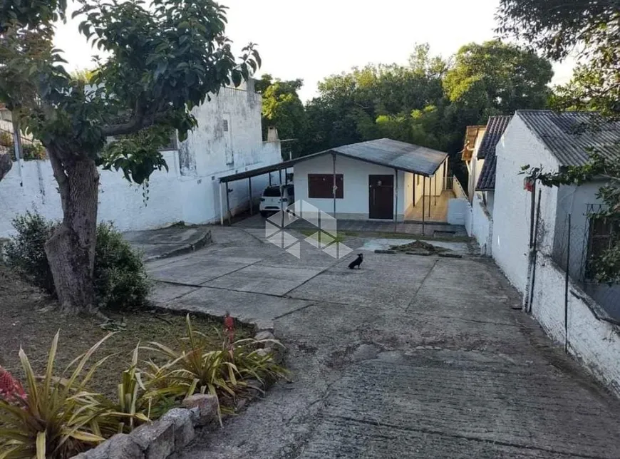 Foto 1 de Casa com 2 Quartos à venda, 80m² em Cavalhada, Porto Alegre