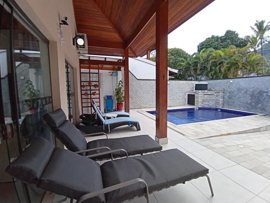 Foto 1 de Casa de Condomínio com 4 Quartos à venda, 210m² em Praia do Lazaro, Ubatuba