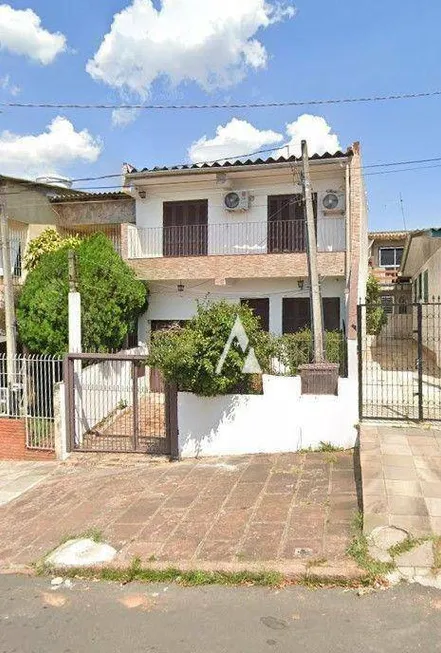 Foto 1 de Casa com 6 Quartos à venda, 174m² em Partenon, Porto Alegre