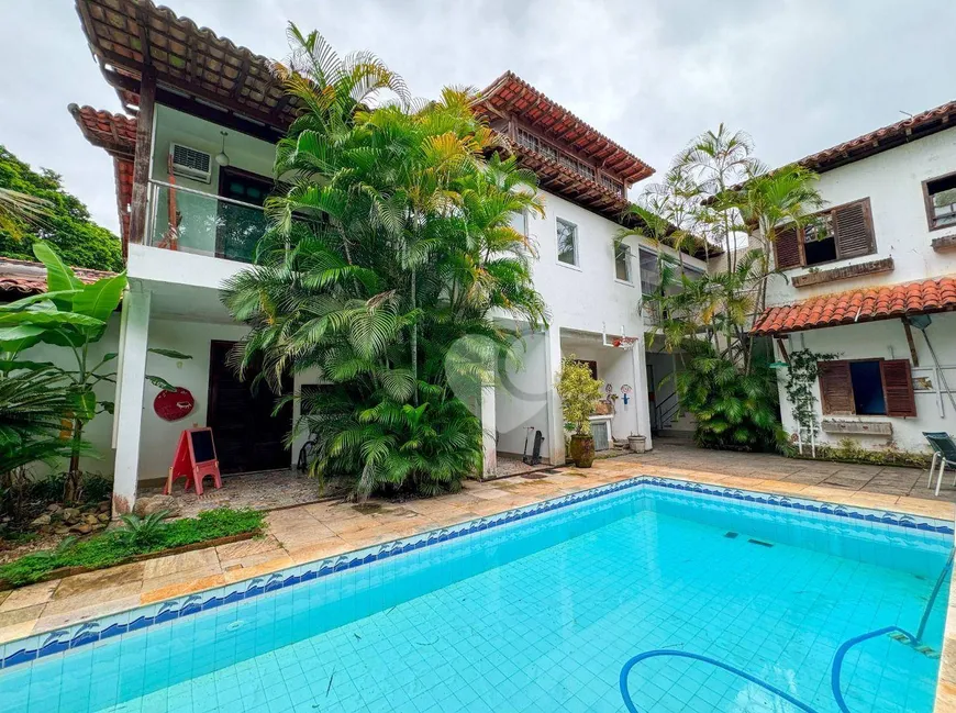 Foto 1 de Casa de Condomínio com 4 Quartos à venda, 628m² em Recreio Dos Bandeirantes, Rio de Janeiro