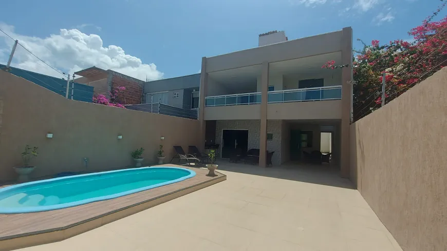 Foto 1 de Casa com 5 Quartos à venda, 175m² em Edson Queiroz, Fortaleza