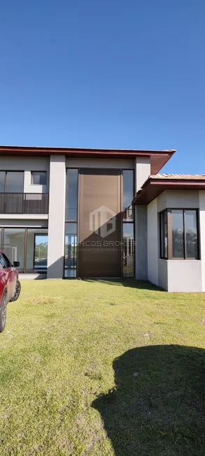 Foto 1 de Casa de Condomínio com 5 Quartos à venda, 304m² em Praia do Forte, Mata de São João