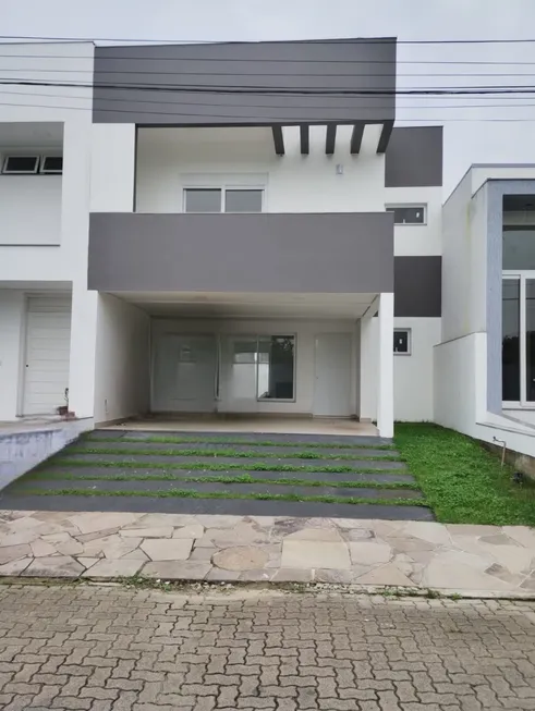 Foto 1 de Casa de Condomínio com 3 Quartos à venda, 170m² em Aberta dos Morros, Porto Alegre