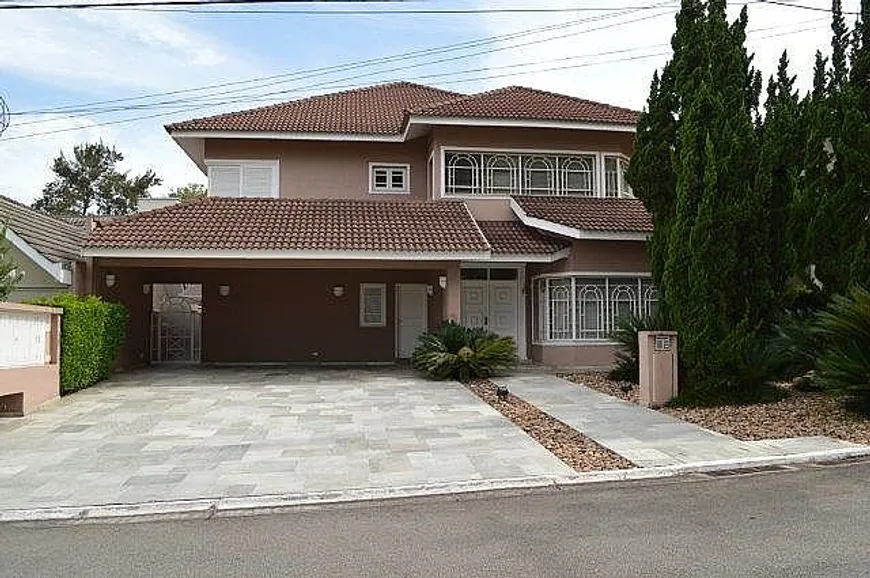 Foto 1 de Casa de Condomínio com 4 Quartos para venda ou aluguel, 600m² em Alphaville, Santana de Parnaíba