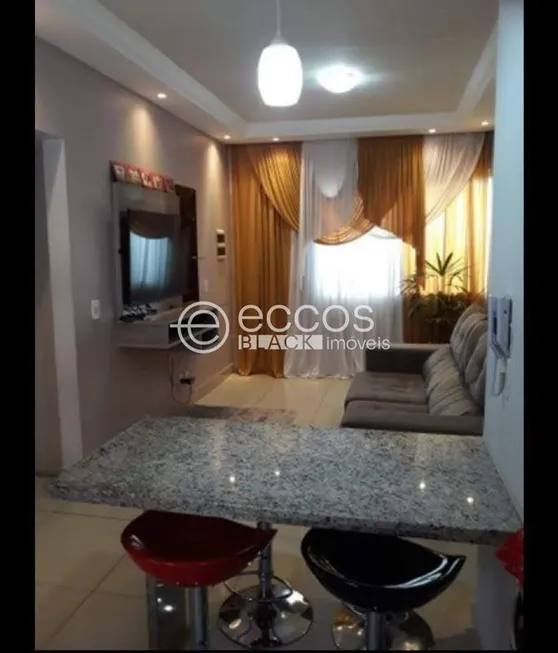 Foto 1 de Casa de Condomínio com 2 Quartos à venda, 83m² em Jardim Holanda, Uberlândia