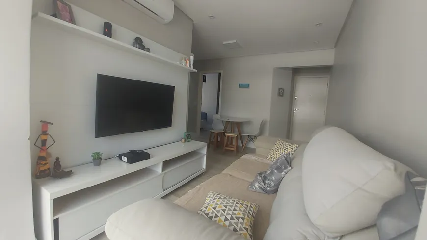 Foto 1 de Apartamento com 2 Quartos à venda, 60m² em Canto do Forte, Praia Grande