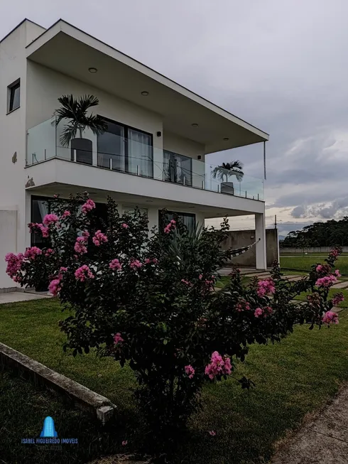 Foto 1 de Casa de Condomínio com 4 Quartos à venda, 269m² em Extensão do Bosque, Rio das Ostras