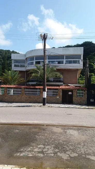 Foto 1 de Casa com 5 Quartos à venda, 440m² em Jardim Guaiúba, Guarujá