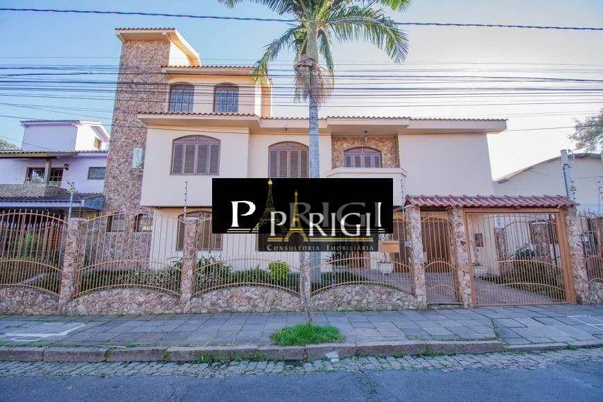 Foto 1 de Casa com 4 Quartos para alugar, 420m² em Jardim Botânico, Porto Alegre